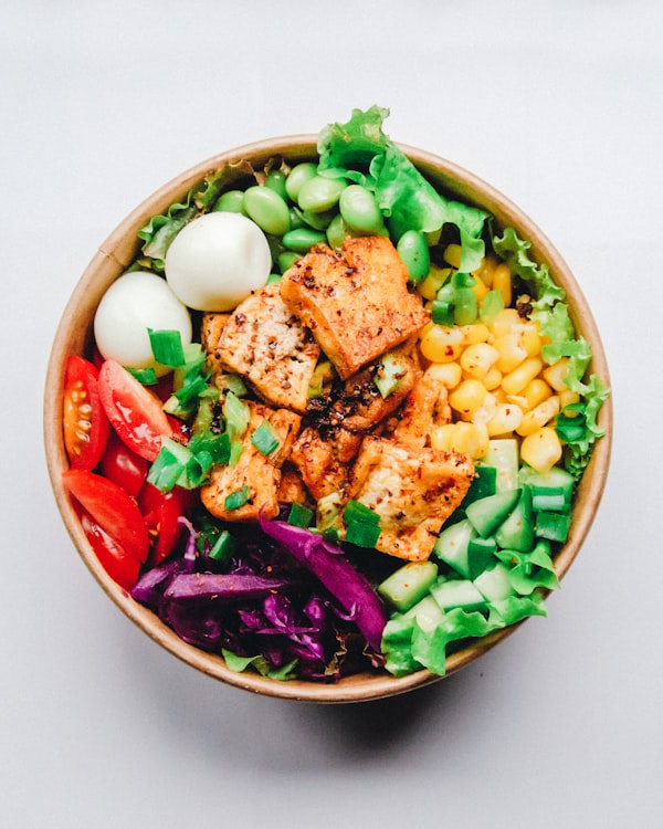 A döner combo bowl from Baba Döner NYC — hand-carved meat over rice with vegetables and sauce