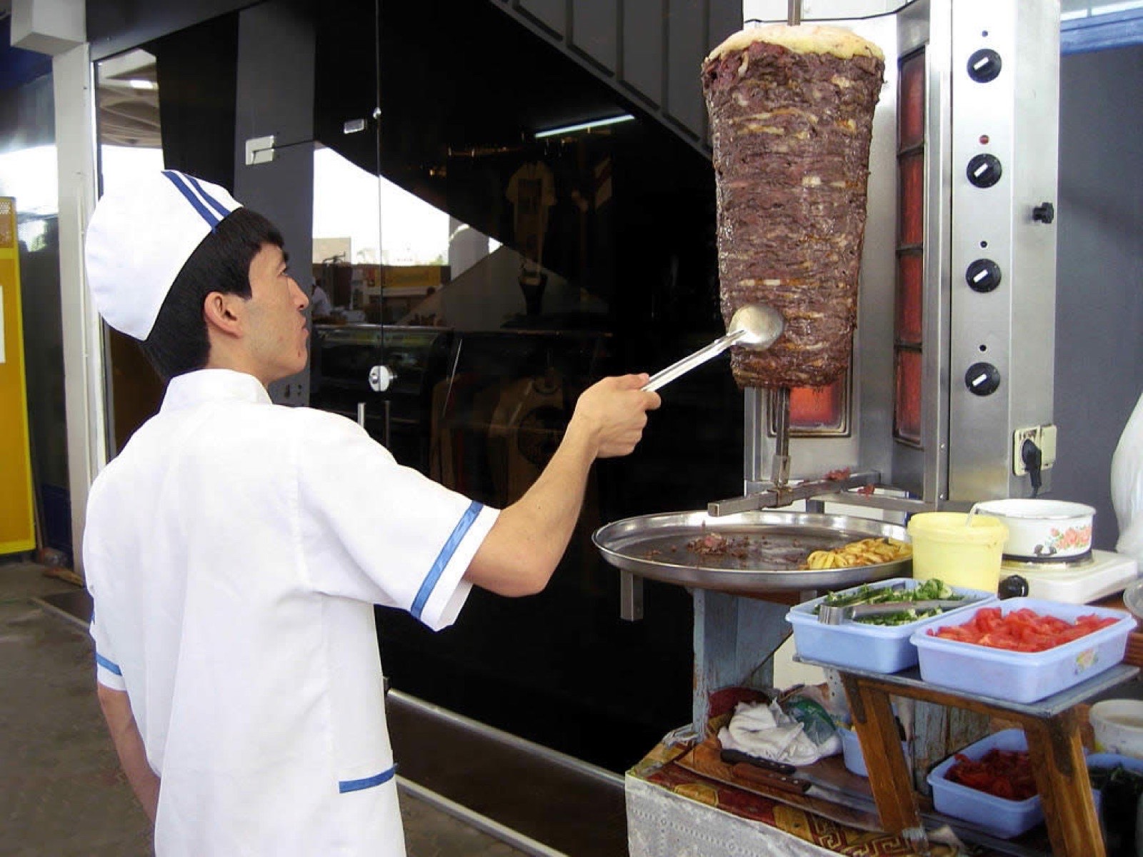 Hand-spiced meat prepared for the vertical spit
